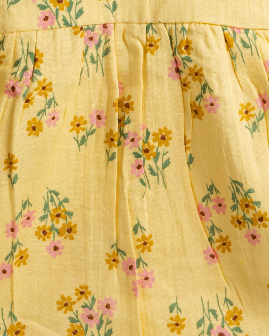 closeup view of Sunbloom yellow cotton frock for girls in soft breathable fabric
